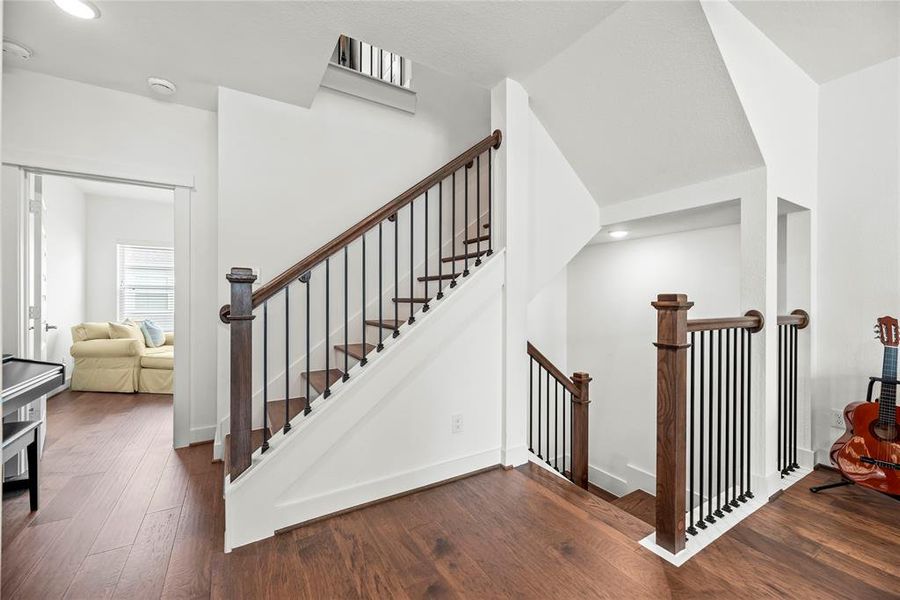 Just up the Stairs on the 2nd Floor we Get a Peek at the Alcove on the Landing (perfect for your Piano or Bookshelf), Entrance to the Primary to the Left and Den/ Owner's Retreat Opens to the Right