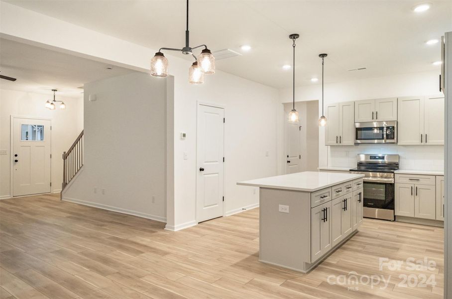 Representative Photo. View into kitchen