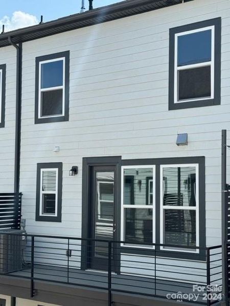 Rear of similar home with garage below