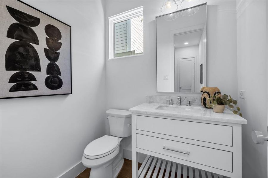 Bathroom with vanity and toilet