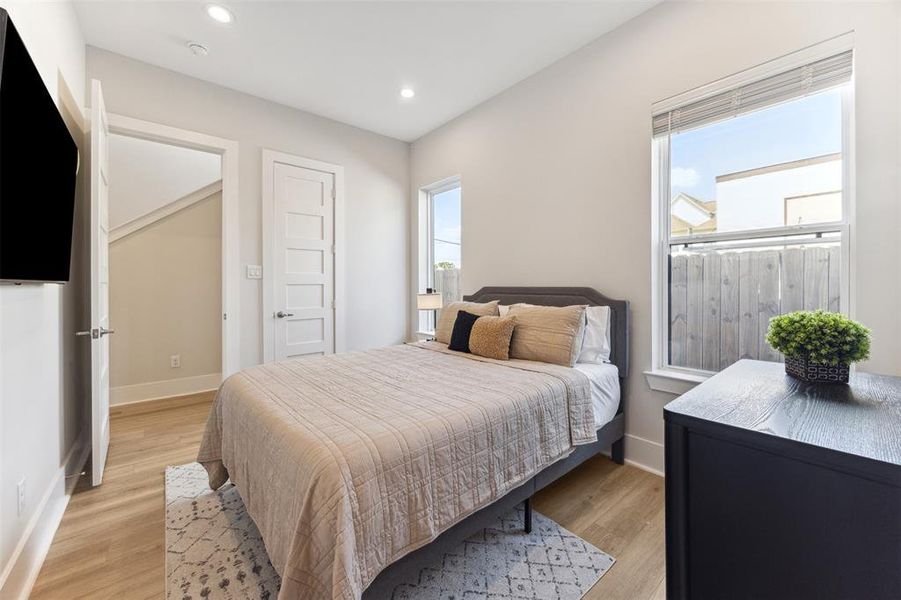 First floor bedroom has a spacious closet and an ensuite bath.