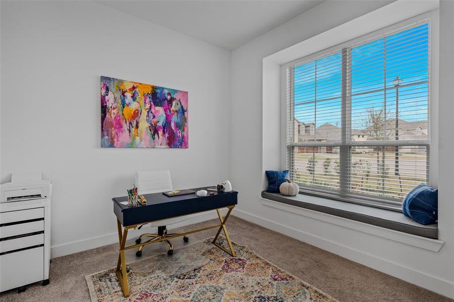 View of carpeted home office