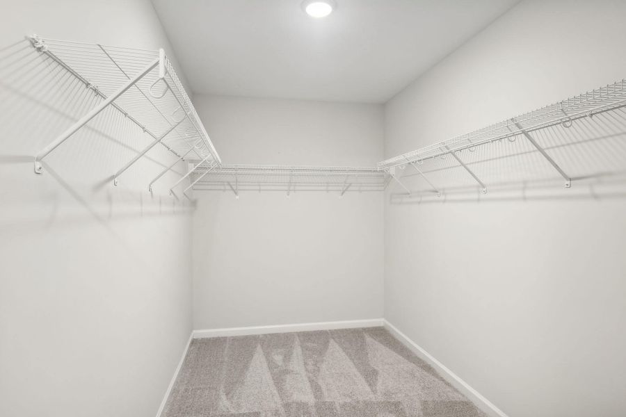 Prescott Walk-In Closet featuring Harmony Finishes