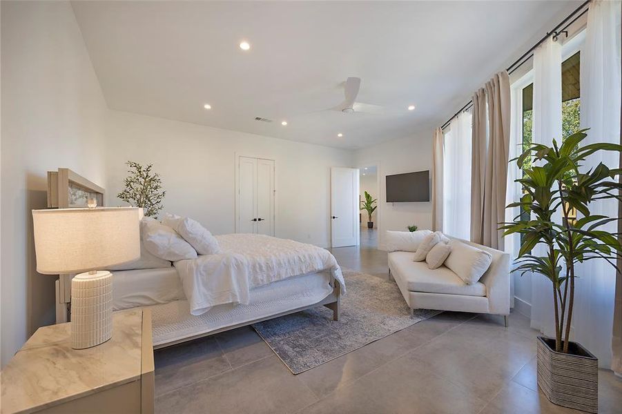 Bedroom with a closet and ceiling fan