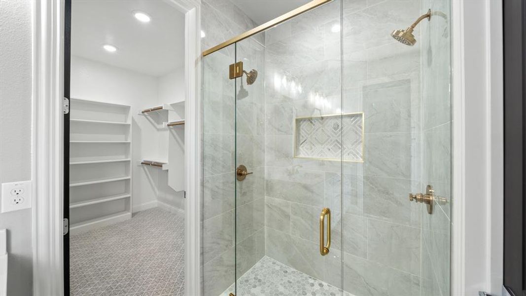Primary Bathroom with separate shower, double sprays and custom walk in closet