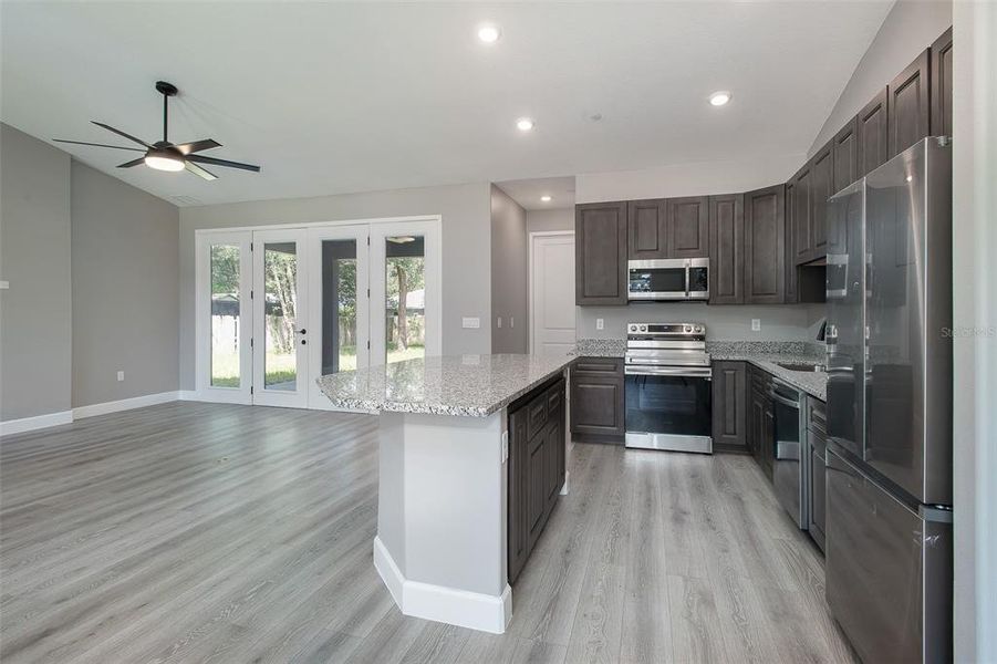 Open concept floor plan. Family room Dining and Kitchen flow together seamlessly to mazimize space. Great for entertaining