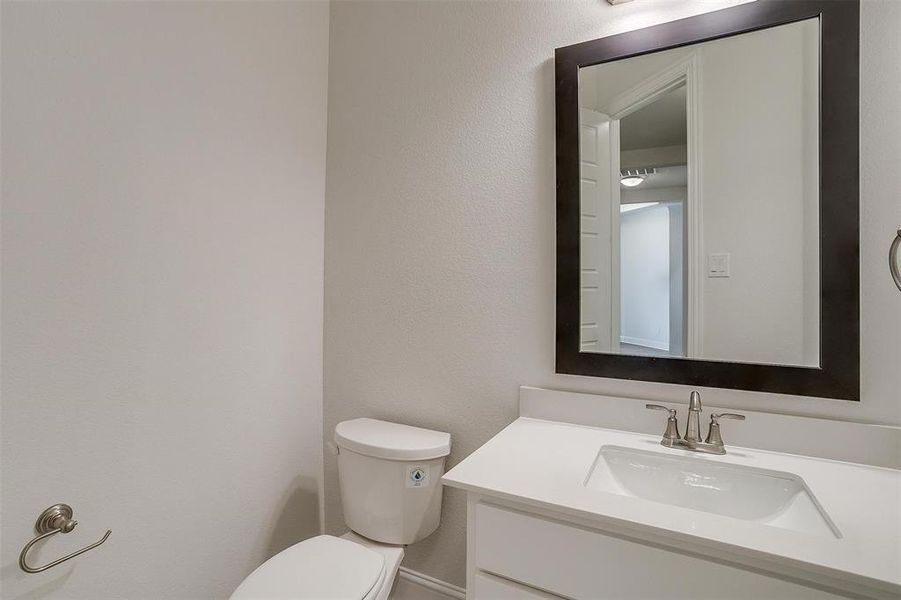 Bathroom with vanity and toilet