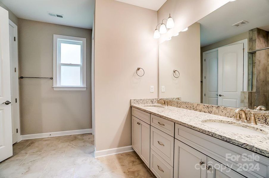 Primary Bathroom with Double Sinks-Similar to Subject Property