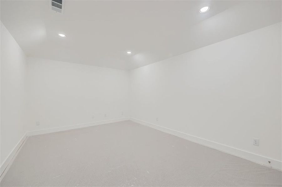 Unfurnished room with carpet