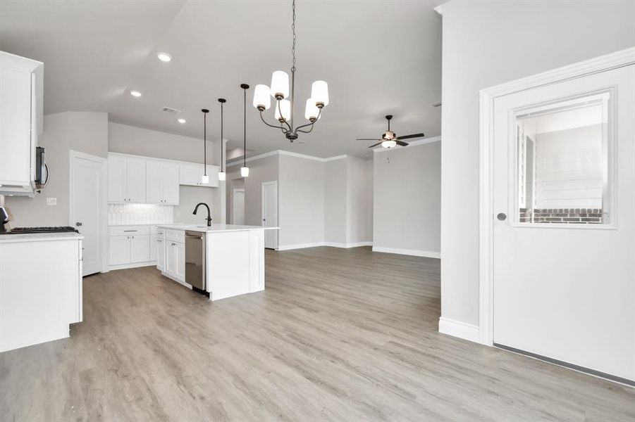 Open concept kitchen with kitchen island