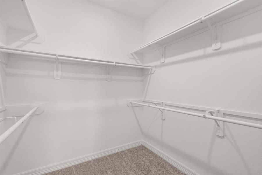 A view of your large primary walk-in Closet