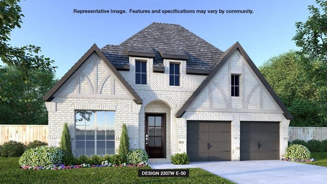 View of front facade featuring a garage