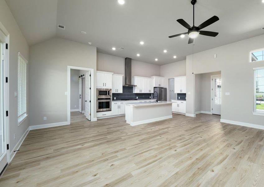 Open layout highlighting the kitchen and the living room.