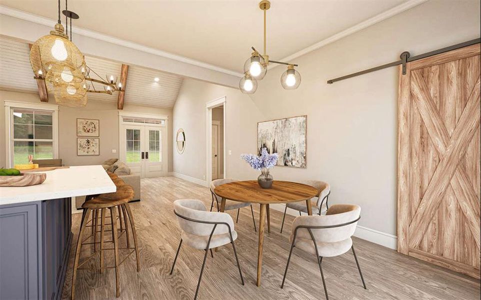 Dining space featuring french doors, vaulted ceiling, light hardwood / wood-style flooring, and a barn door