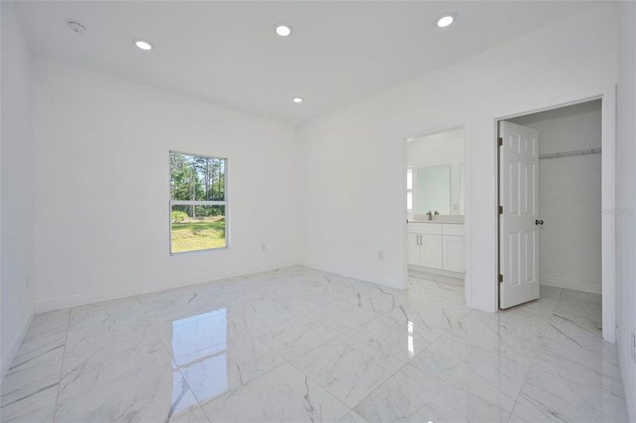 Master bedroom.  Door to right opens to the walk-in closet