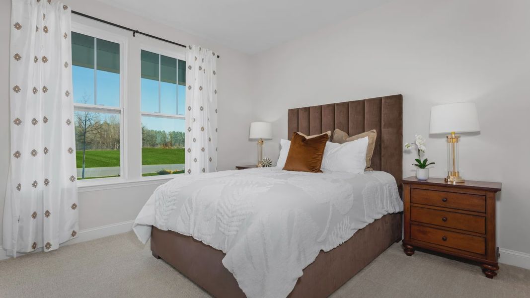 Secondary Bedroom - Cooper Model Home at The Farm at Neill's Creek by DRB Homes