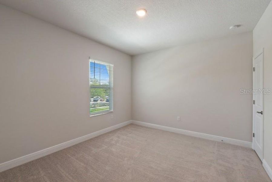 Bedroom Two **Photos are of a Similar Home