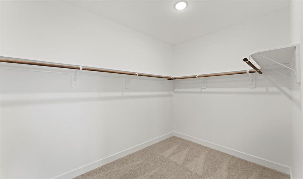 Large walk-in closet off the primary bath (*Photo not of actual home and used for illustration purposes only.)