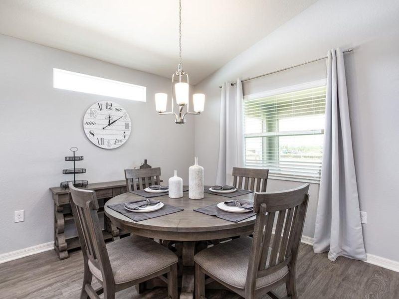 Sunny casual dining cafe - Serendipity home plan by Highland Homes