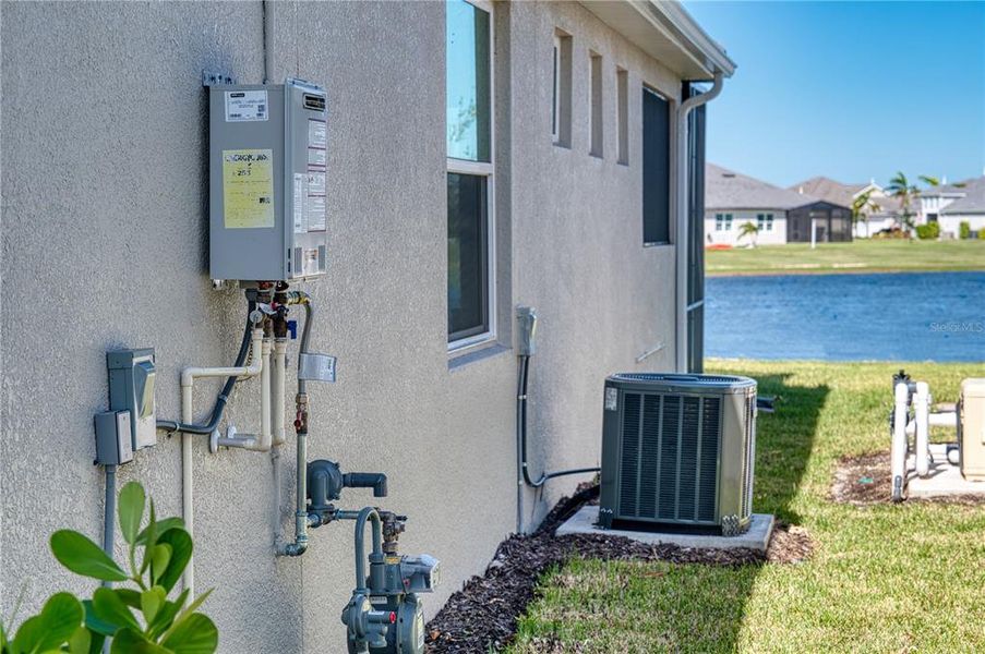 Tankless gas water heater.