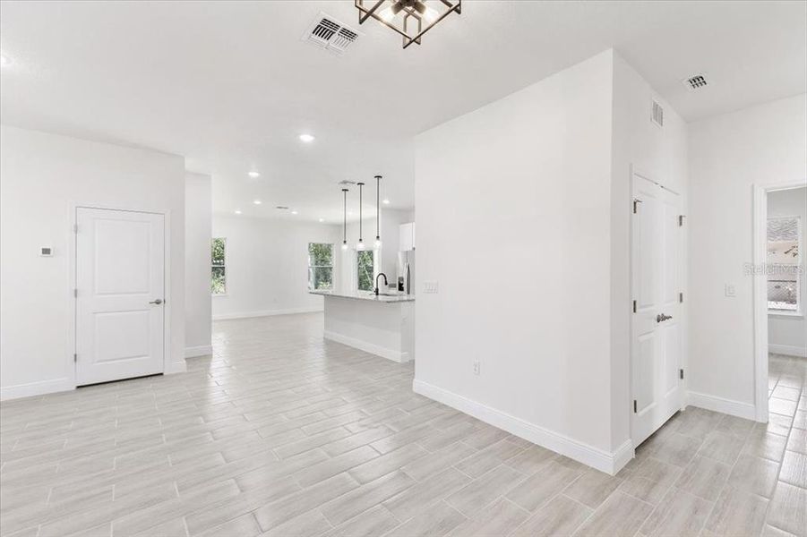 Washer and Dryer Closet to the right with the double doors