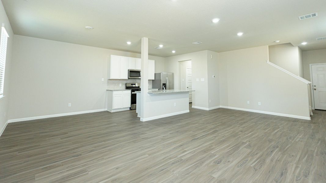 Family Room to Kitchen and Dining Area