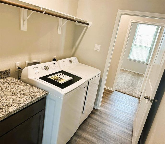 Granite folding counter, broom closet & the washer/dryer are included!