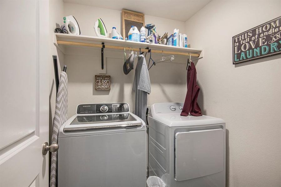 Laundry room with separate washer and dryer