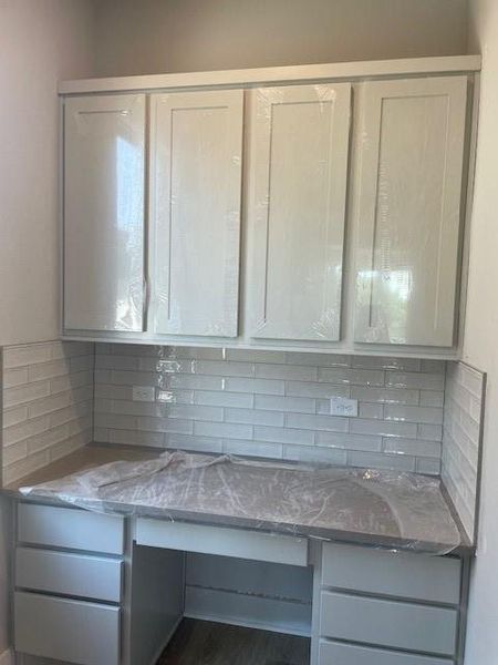 built in desk off kitchen