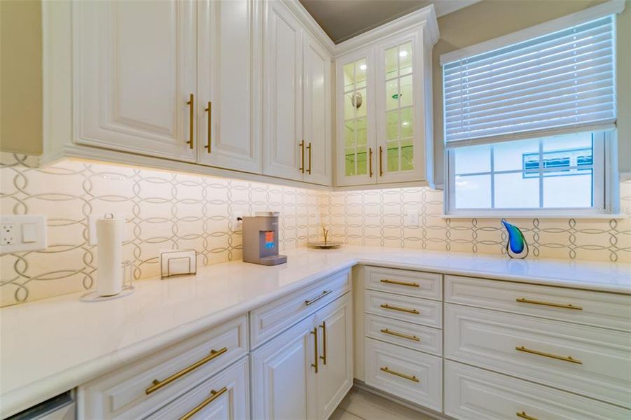 Upgraded backsplash and cabinetry