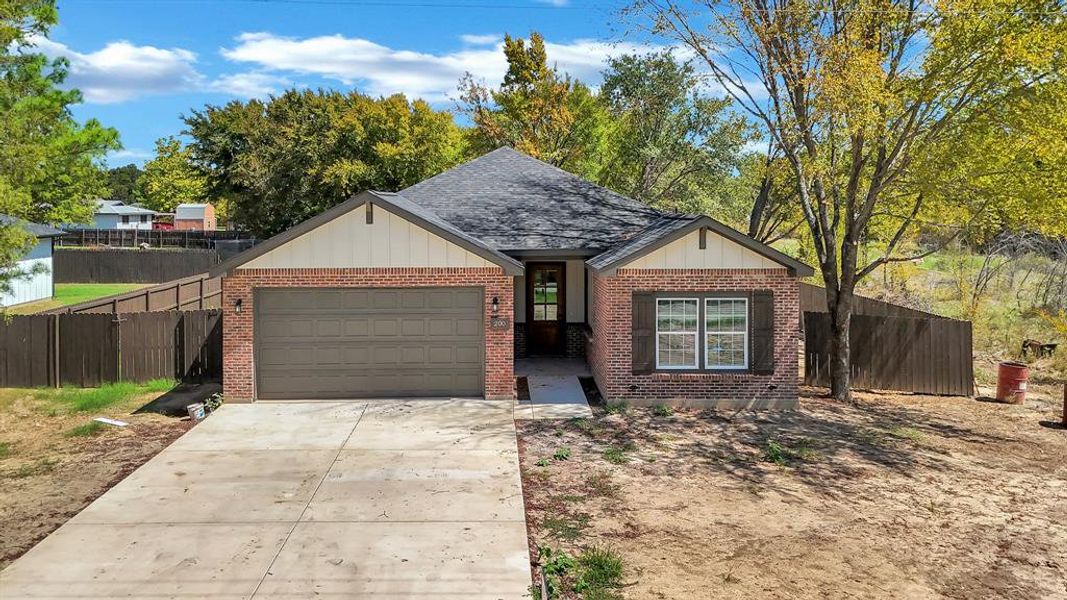 Single story home with a garage