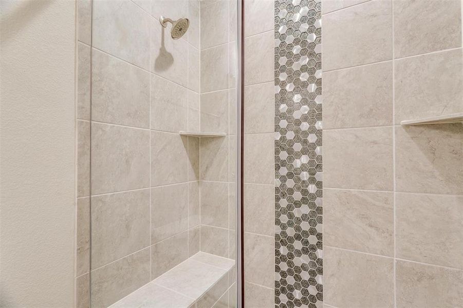 Bathroom with tiled shower