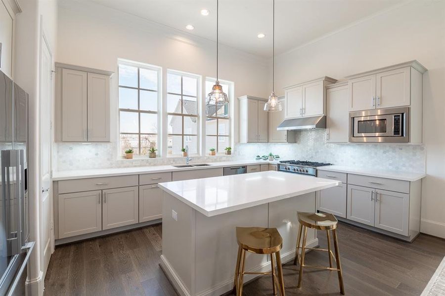 Bright and light kitchen with Fisher & Paykel appliances and furniture grade cabinets. (similar home and features)