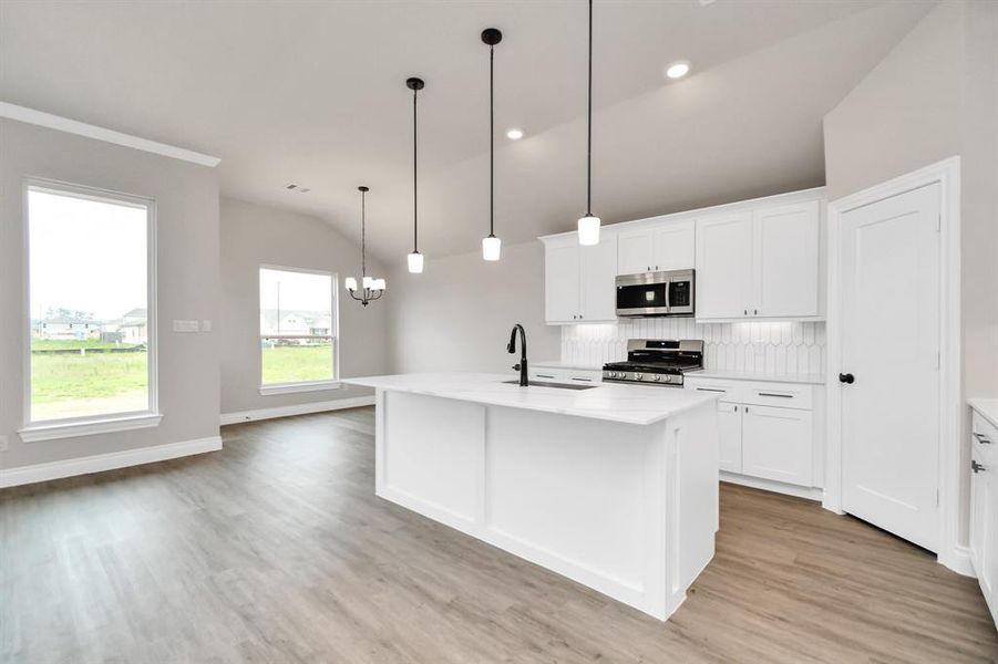 Open concept kitchen with kitchen island