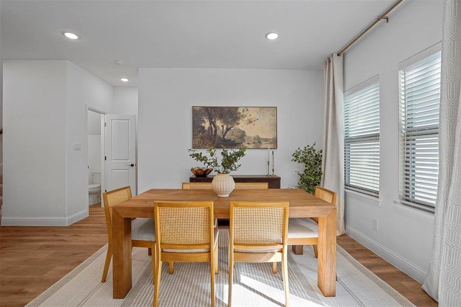 Dining room with light wood-type flooring