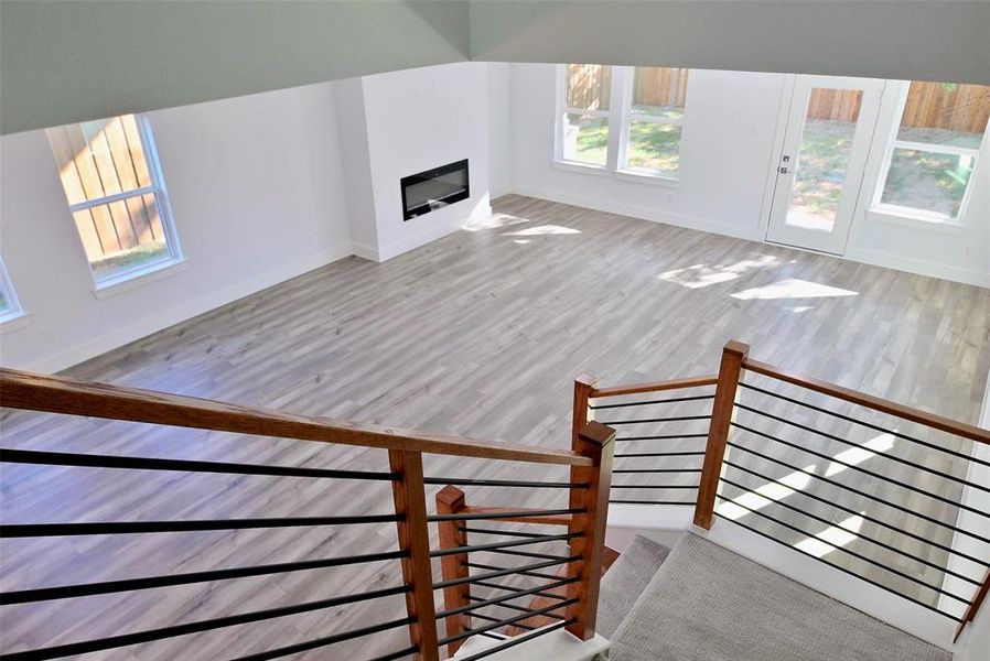 Unfurnished living room featuring light hardwood / wood-style floors