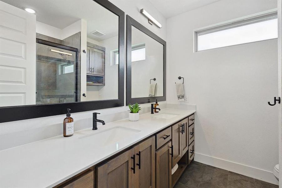 Extra large vanity in guest bathrooms.