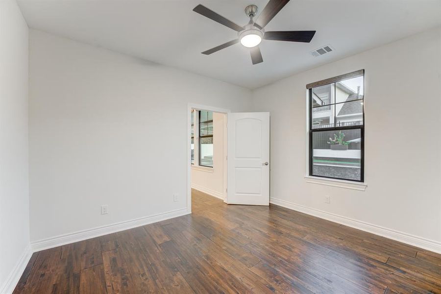 This is one of the spacious secondary bedrooms downstairs.