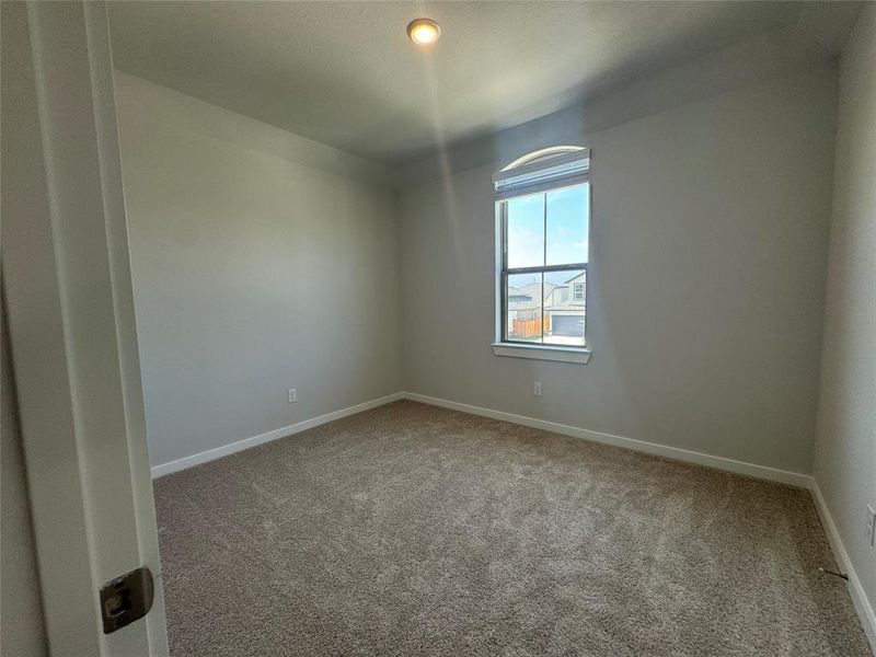 Bedroom 4 located upstairs.