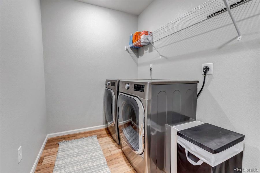 Upstairs laundry room with included washer and dryer