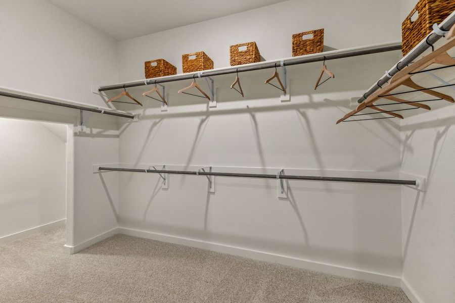 Primary Closet in the Stanley II home plan by Trophy Signature Homes – REPRESENTATIVE PHOTO