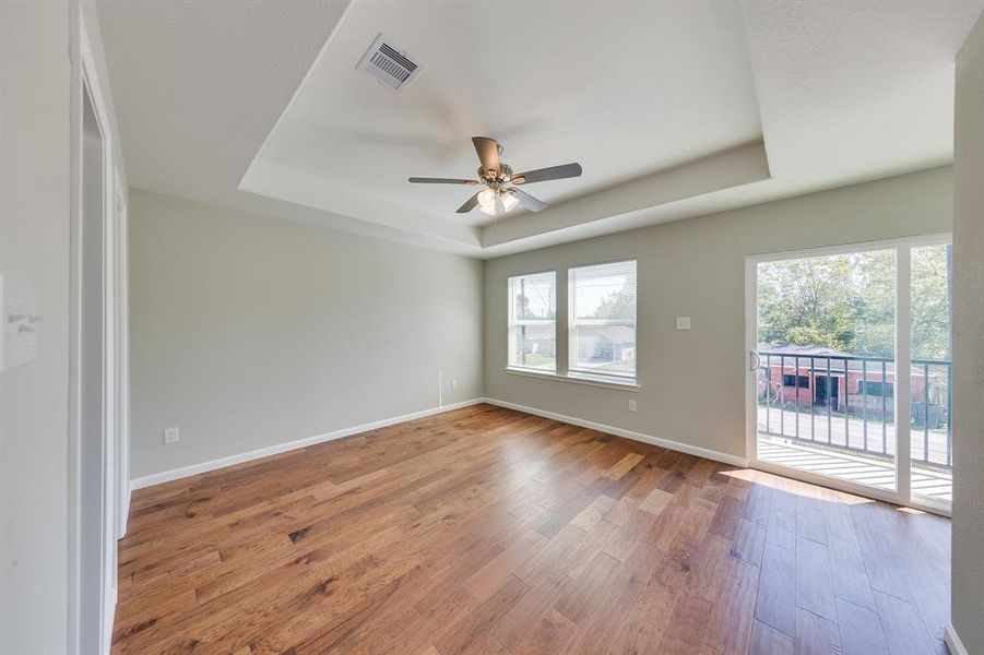 The master bedroom offers private access to a charming balcony, perfect for enjoying morning coffee or evening sunsets. This outdoor space extends your living area and provides a serene retreat where you can relax and unwind while taking in the fresh air and beautiful views.