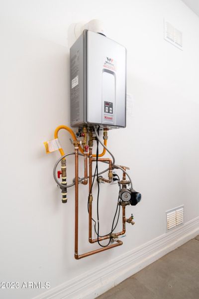 Tankless water heater with recirc pump