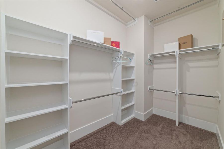 Massive Walk In Closet Has Plenty Of Room For Everything You Have To Fill It. Custom Shelving Throughout