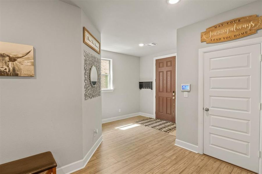 Foyer featuring light hardwood / wood-style floors