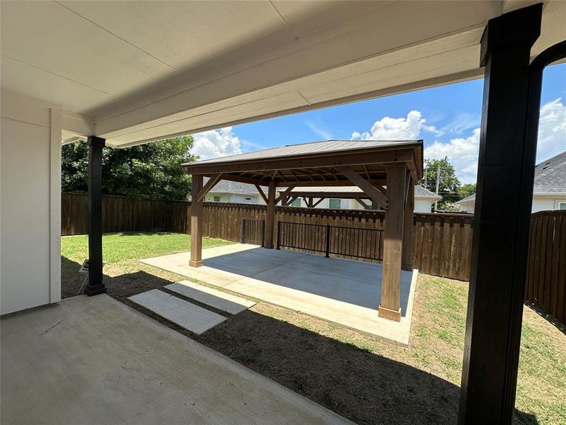 Welcome to your backyard, just wow large covered porch and oversized concrete / cedar wood gazebo