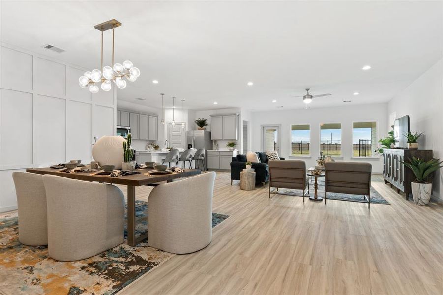 The Casual Dining Area is Open and looks out to the Wall of Windows and into the Family Area and the Stunning Gourmet Kitchen!  **Image representative of plan only and may vary as built**NEW Photos coming soon!