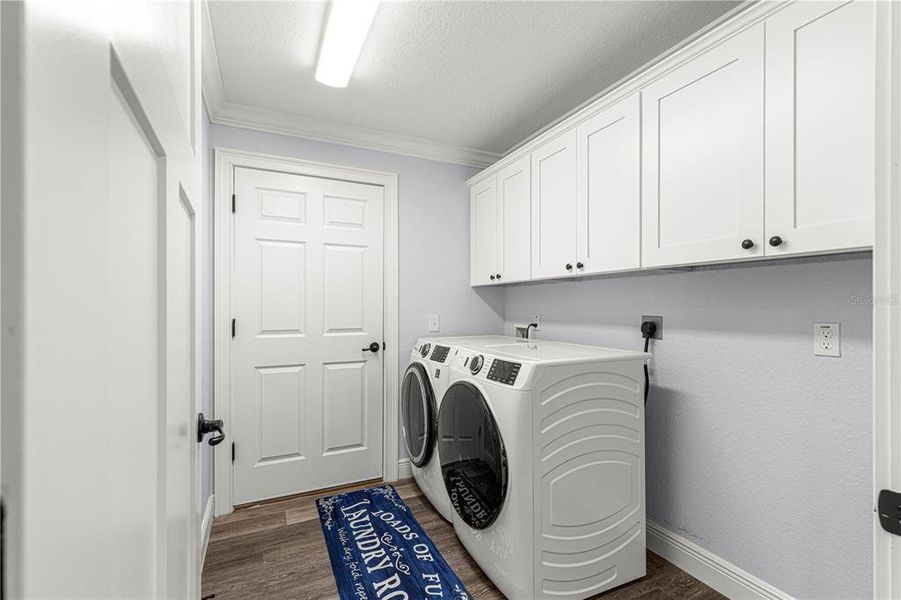 Inside laundry with GE Energy Smart washer and dryer