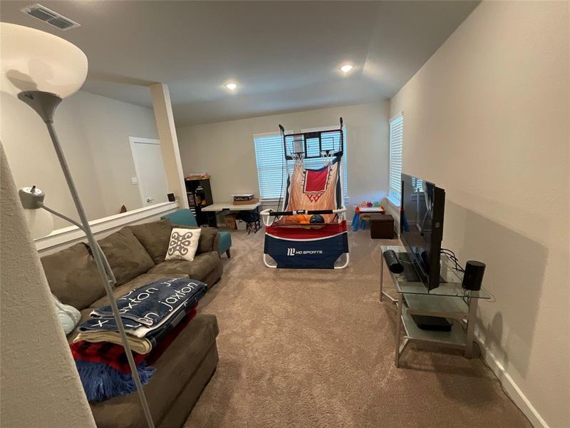 Living room with carpet floors