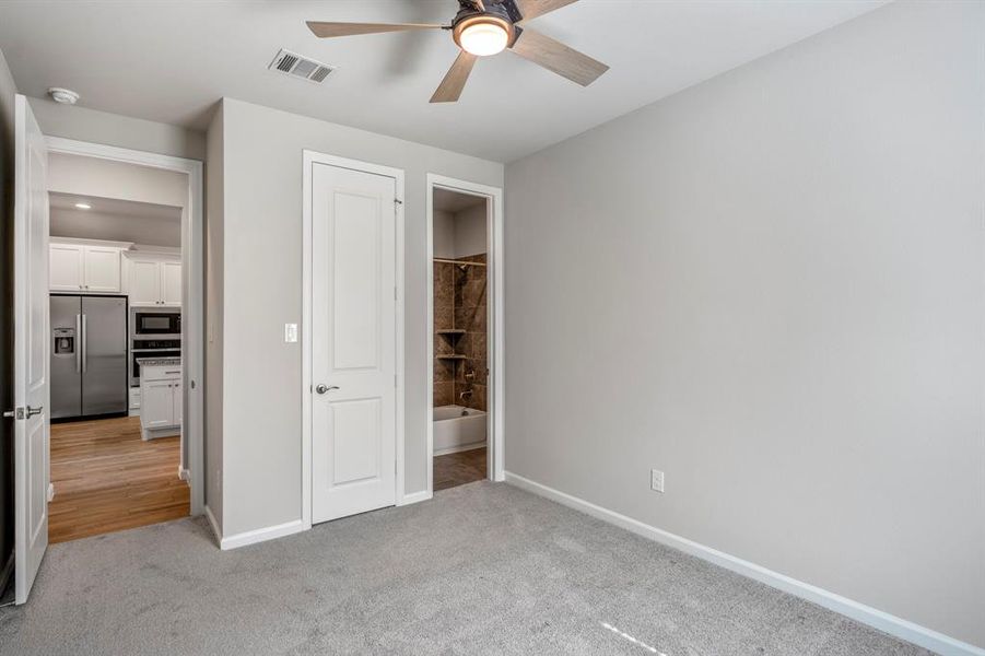 One of three secondary bedrooms